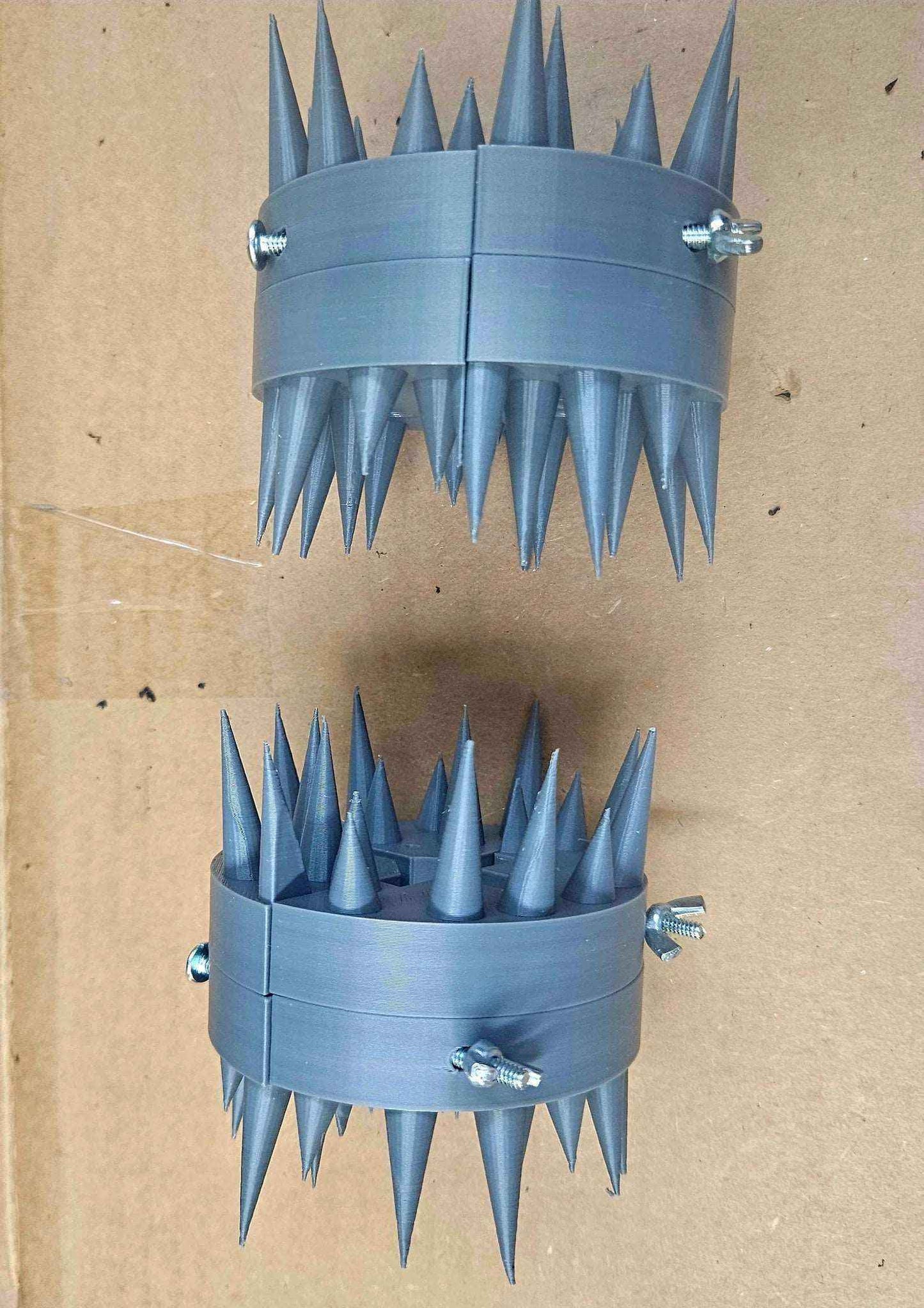 Coon Claw by AirBoss mounted on deer feeder pole preventing raccoon access